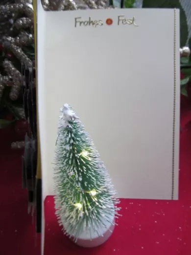 Weihnachtskarte mit 3-D-Motiv Nikolaus am Schreibtisch